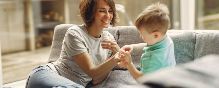 mother-giving-his-son-medicine-3985220